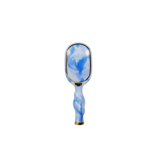 Blue and white hairbrush on a white background