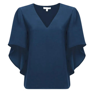 A navy blue blouse with a V-neckline and wide, layered flutter sleeves, shown against a plain white background.