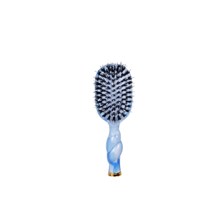 Blue and white hairbrush on a white background