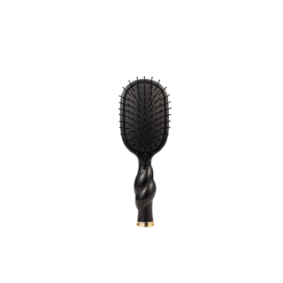 Black hairbrush with a twisted handle on a white background