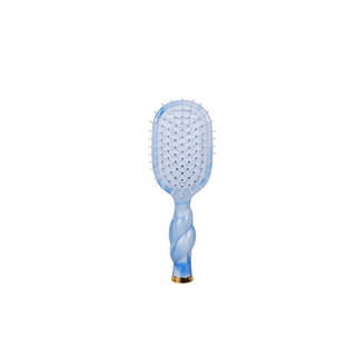 Blue paddle hairbrush on a white background